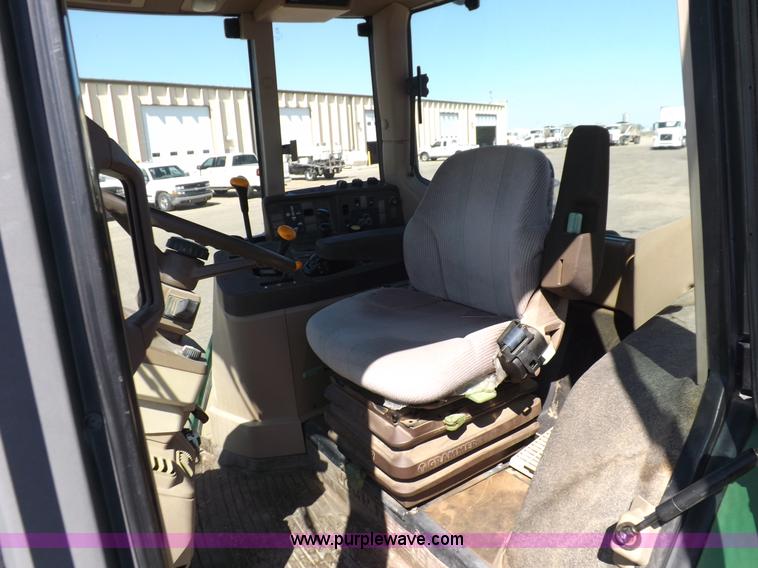 image for item H9096 1998 John Deere 6310 tractor