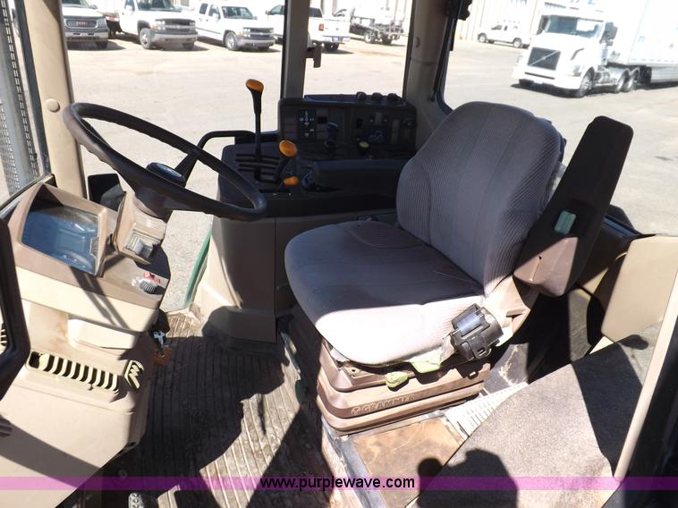 image for item H9096 1998 John Deere 6310 tractor