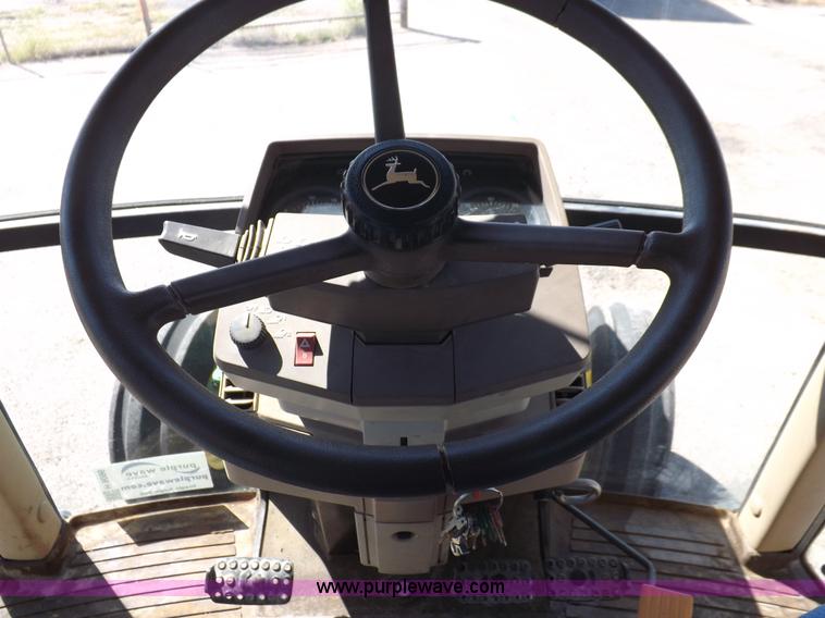 image for item H9096 1998 John Deere 6310 tractor