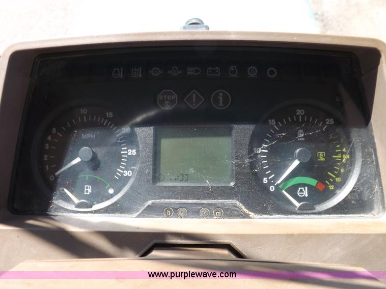 image for item H9096 1998 John Deere 6310 tractor