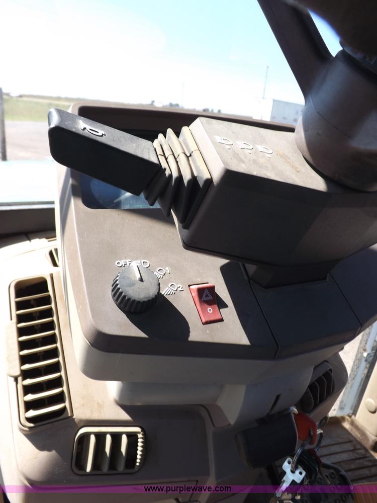 image for item H9096 1998 John Deere 6310 tractor