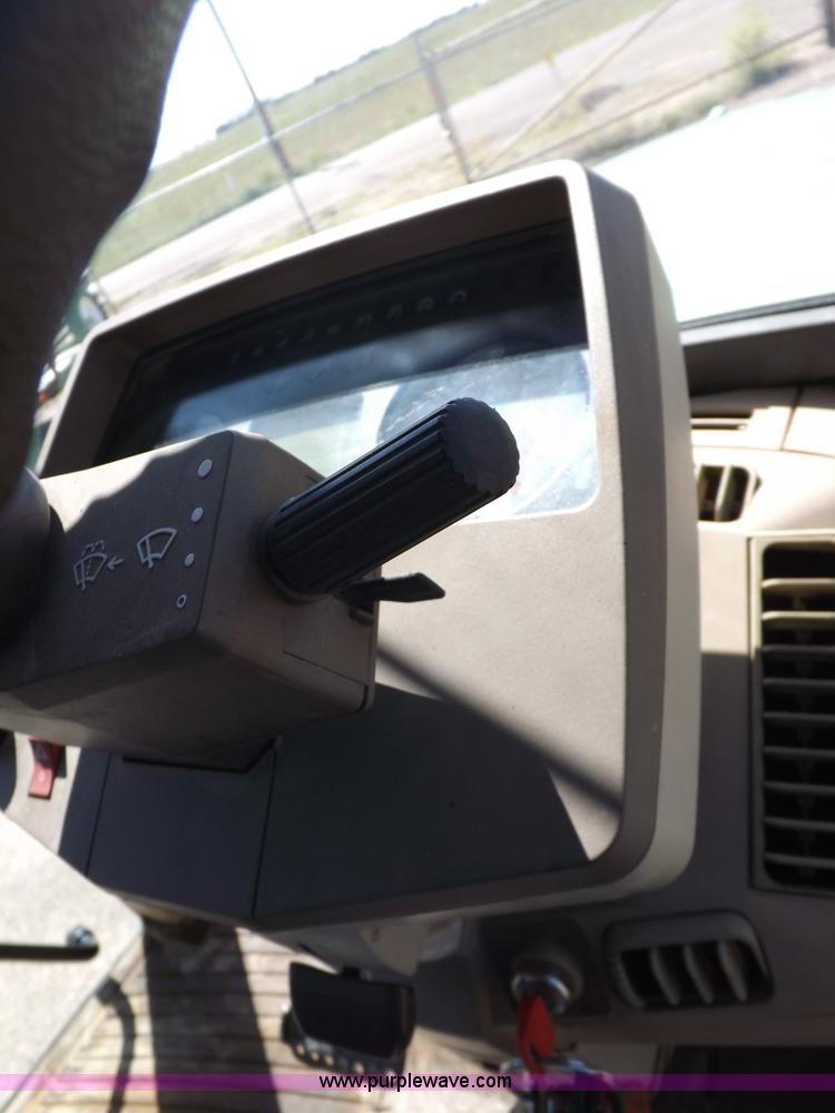 image for item H9096 1998 John Deere 6310 tractor