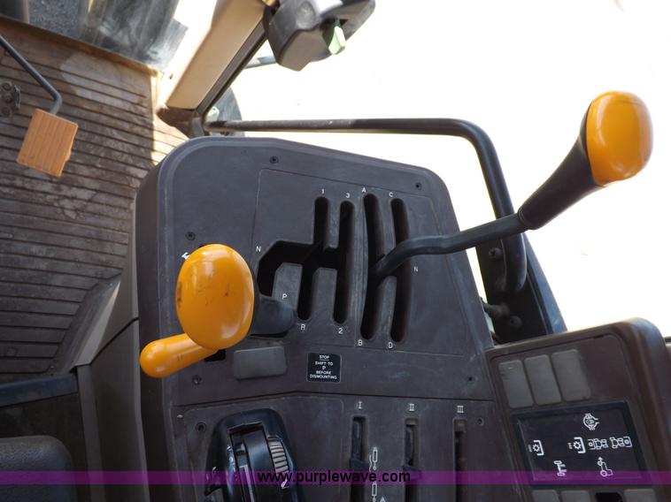 image for item H9096 1998 John Deere 6310 tractor