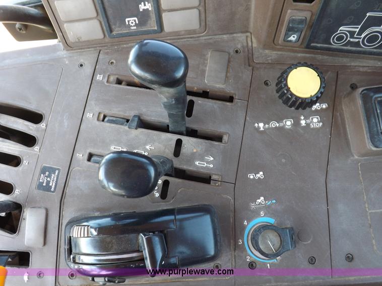 image for item H9096 1998 John Deere 6310 tractor