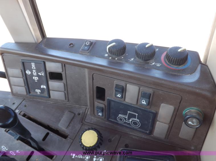 image for item H9096 1998 John Deere 6310 tractor