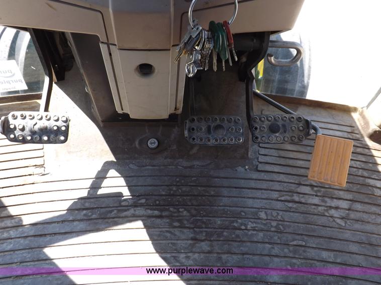 image for item H9096 1998 John Deere 6310 tractor