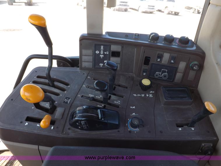 image for item H9096 1998 John Deere 6310 tractor