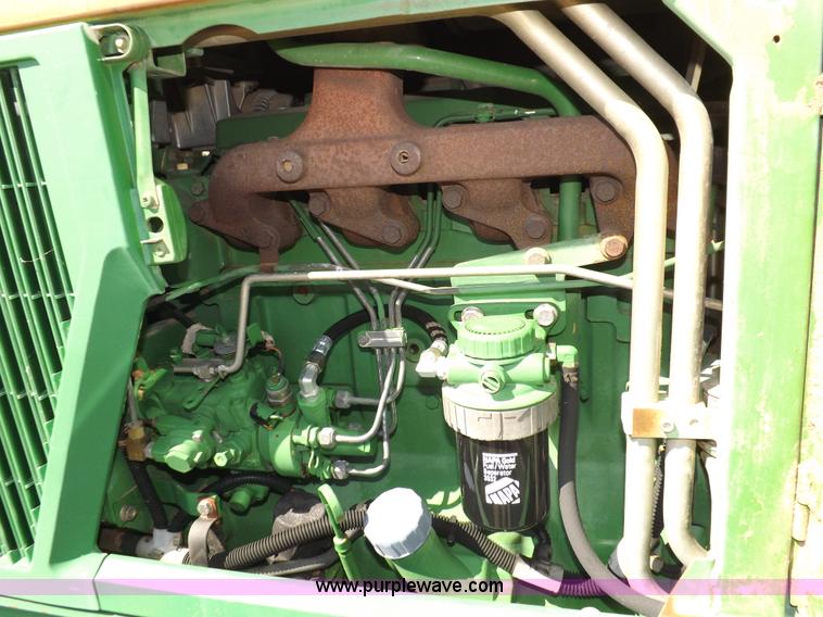 image for item H9096 1998 John Deere 6310 tractor