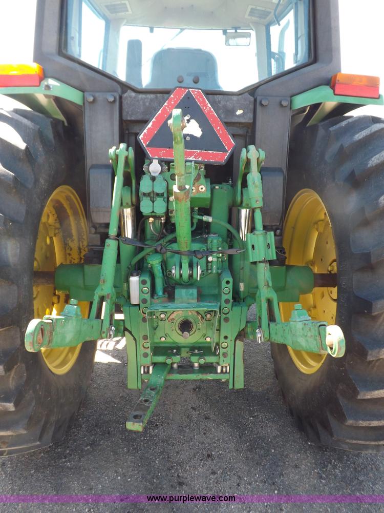 image for item H9096 1998 John Deere 6310 tractor