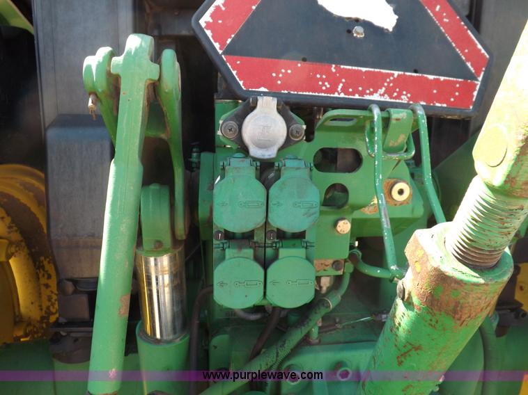 image for item H9096 1998 John Deere 6310 tractor