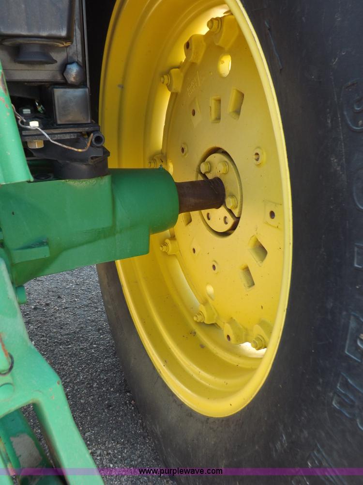 image for item H9096 1998 John Deere 6310 tractor