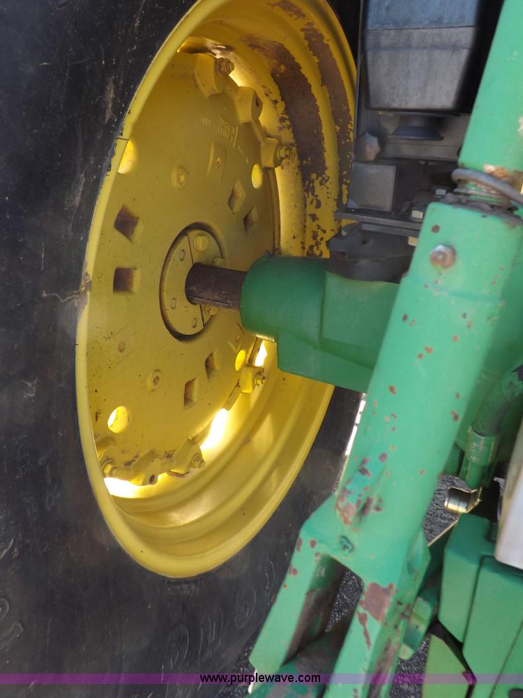 image for item H9096 1998 John Deere 6310 tractor