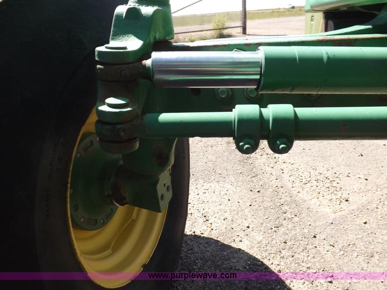 image for item H9096 1998 John Deere 6310 tractor