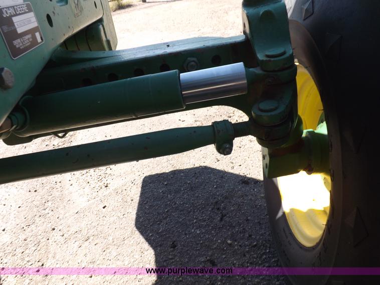 image for item H9096 1998 John Deere 6310 tractor