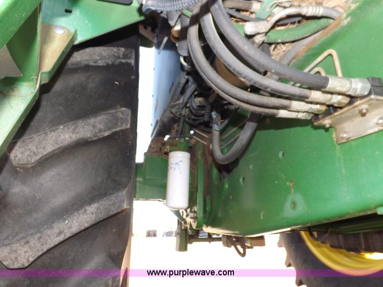 image for item H9096 1998 John Deere 6310 tractor