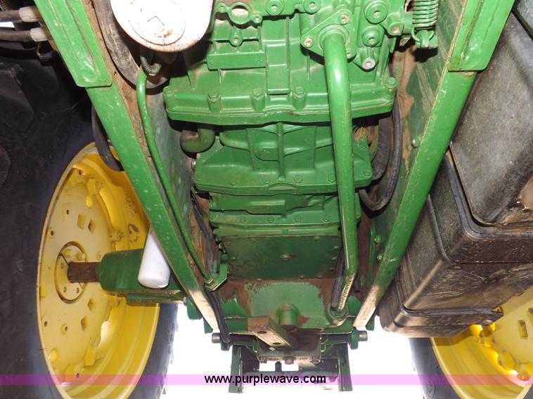 image for item H9096 1998 John Deere 6310 tractor