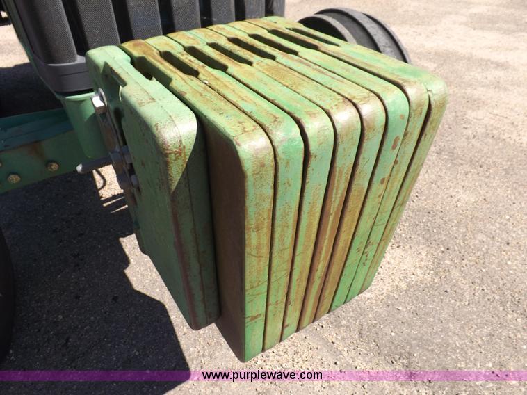 image for item H9096 1998 John Deere 6310 tractor