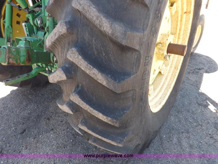 image for item H9096 1998 John Deere 6310 tractor