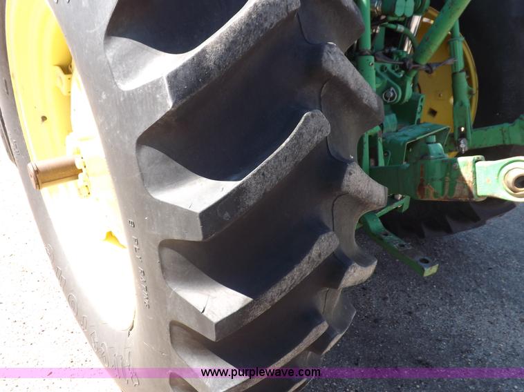 image for item H9096 1998 John Deere 6310 tractor