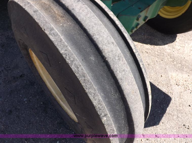 image for item H9096 1998 John Deere 6310 tractor