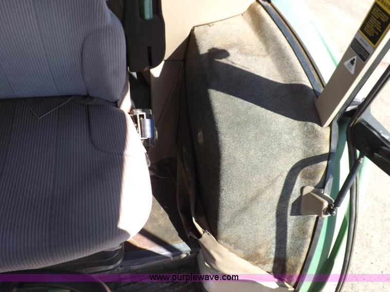 image for item H9096 1998 John Deere 6310 tractor