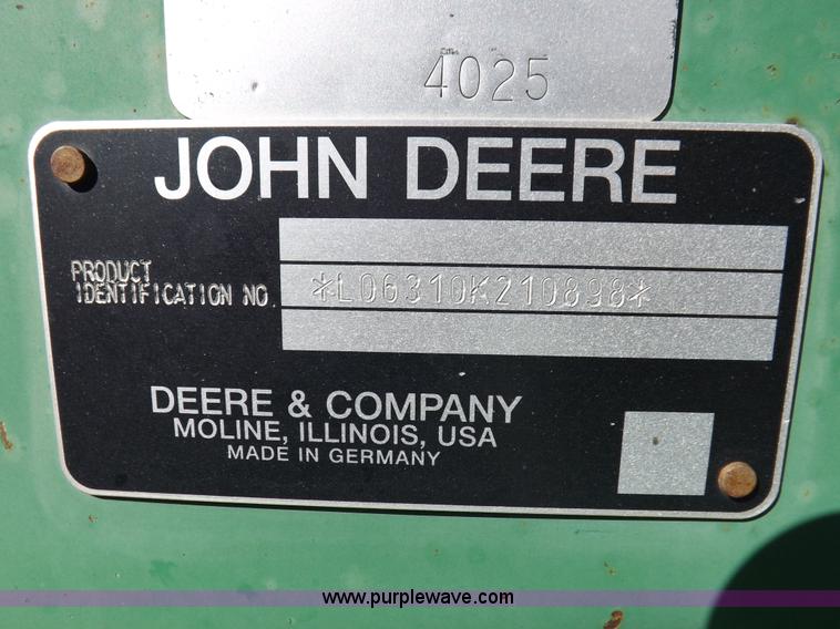 image for item H9096 1998 John Deere 6310 tractor