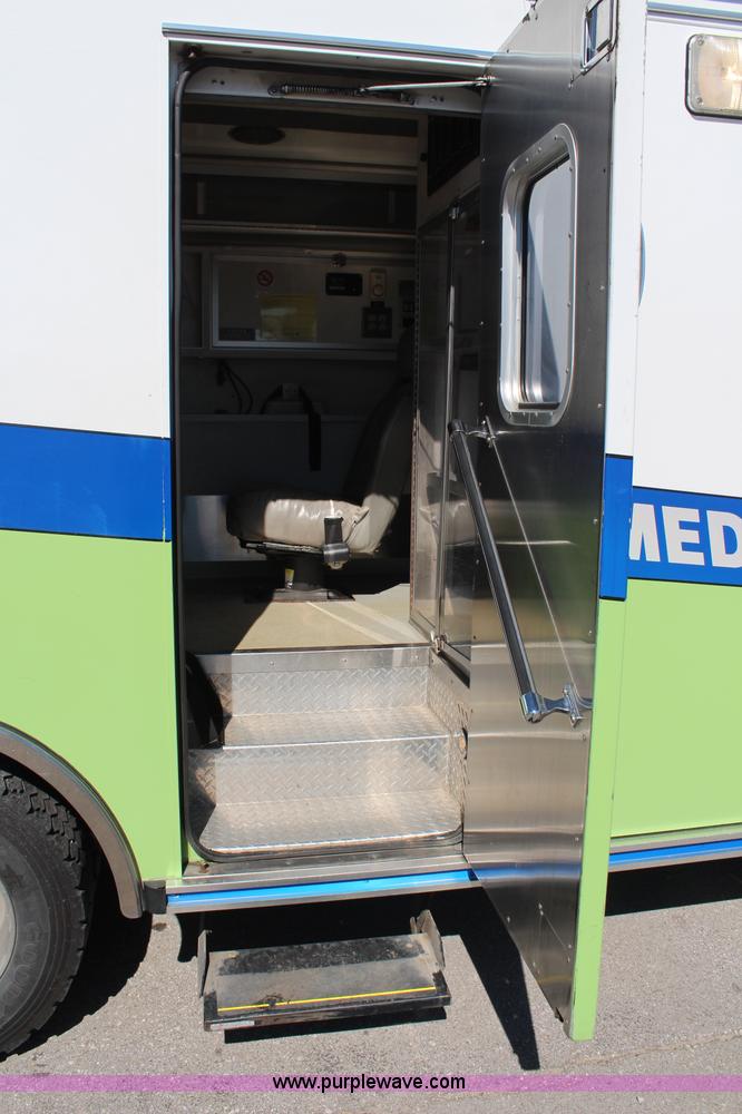 image for item I5884 2000 Freightliner FL60 ambulance