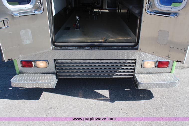 image for item I5884 2000 Freightliner FL60 ambulance