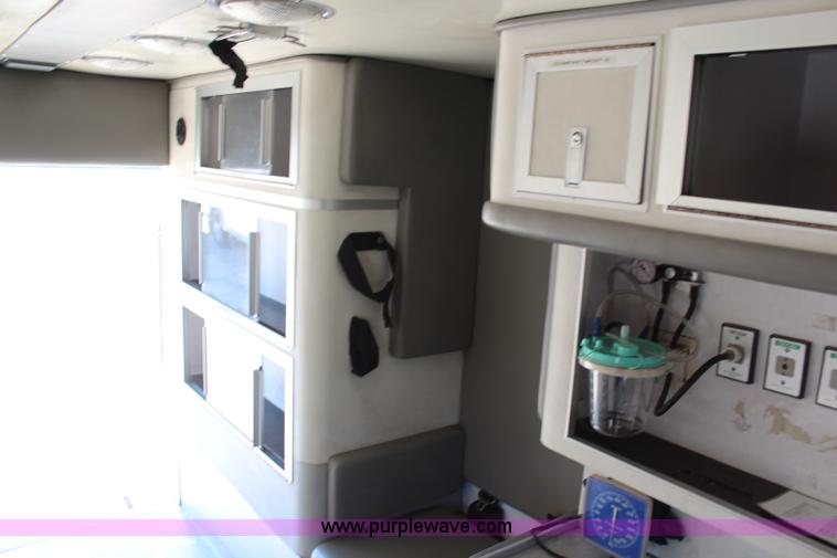 image for item I5884 2000 Freightliner FL60 ambulance