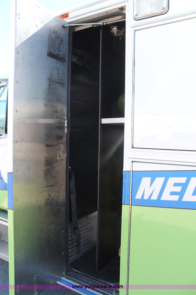 image for item I5884 2000 Freightliner FL60 ambulance