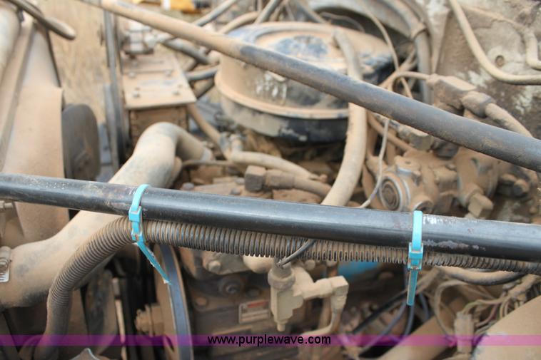 image for item H8832 1980 GMC 7000 Big Wheels sprayer