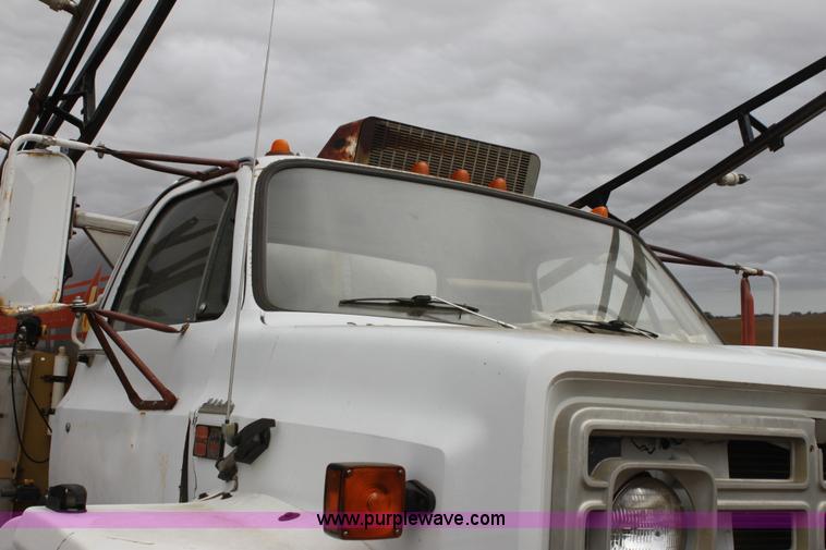 image for item H8832 1980 GMC 7000 Big Wheels sprayer