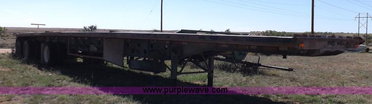 image for item H9086 2003 Transcraft TL2000F3 flatbed trailer