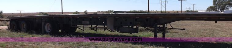 image for item H9086 2003 Transcraft TL2000F3 flatbed trailer