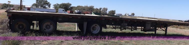 image for item H9086 2003 Transcraft TL2000F3 flatbed trailer