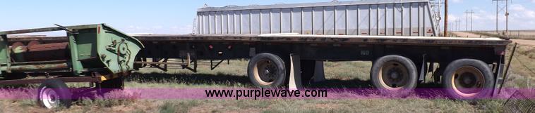 image for item H9086 2003 Transcraft TL2000F3 flatbed trailer