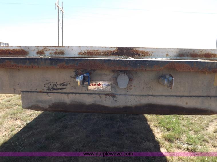 image for item H9086 2003 Transcraft TL2000F3 flatbed trailer
