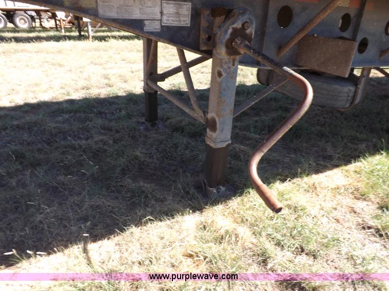 image for item H9086 2003 Transcraft TL2000F3 flatbed trailer