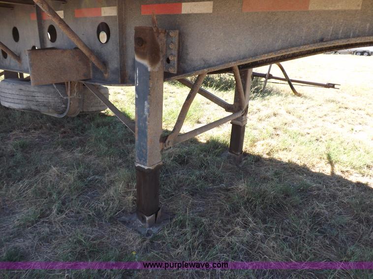 image for item H9086 2003 Transcraft TL2000F3 flatbed trailer