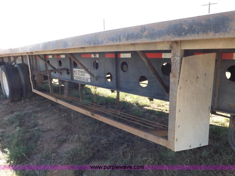 image for item H9086 2003 Transcraft TL2000F3 flatbed trailer