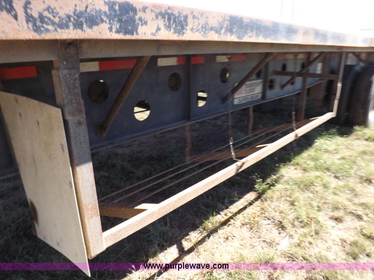 image for item H9086 2003 Transcraft TL2000F3 flatbed trailer
