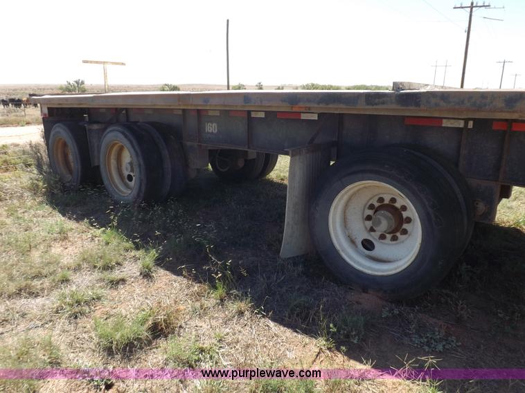 image for item H9086 2003 Transcraft TL2000F3 flatbed trailer