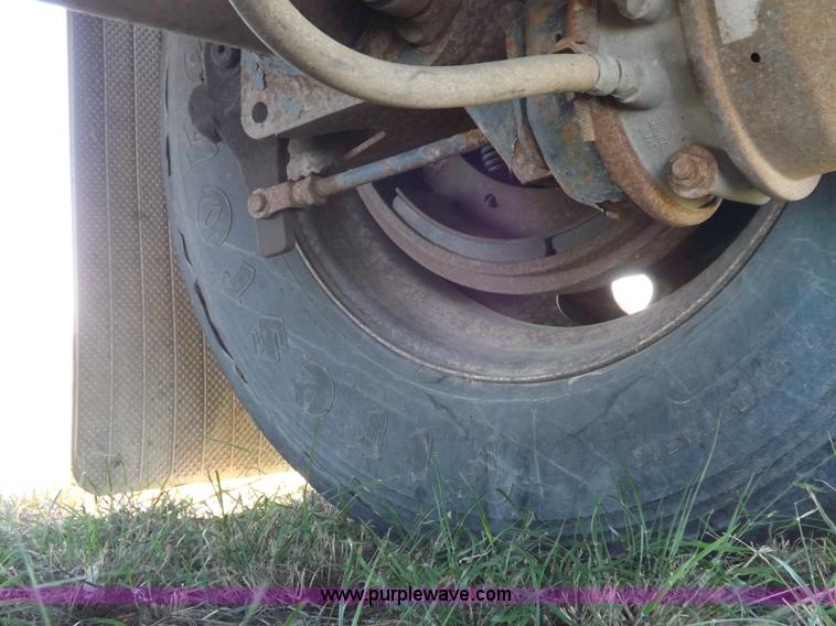 image for item H9086 2003 Transcraft TL2000F3 flatbed trailer