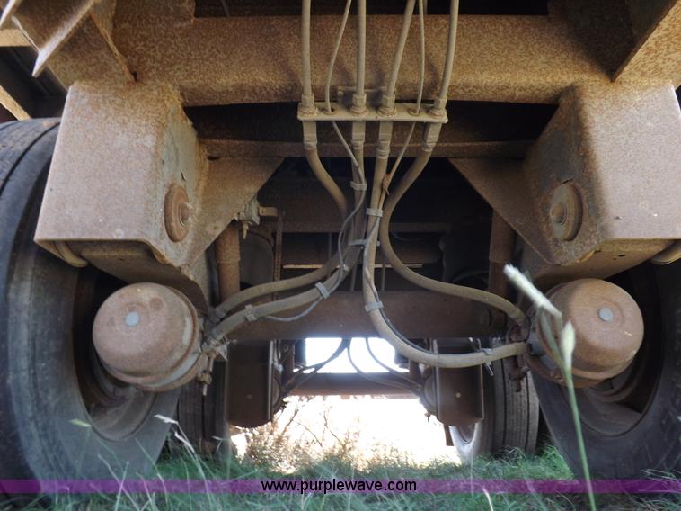 image for item H9086 2003 Transcraft TL2000F3 flatbed trailer