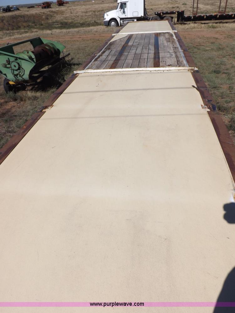 image for item H9086 2003 Transcraft TL2000F3 flatbed trailer