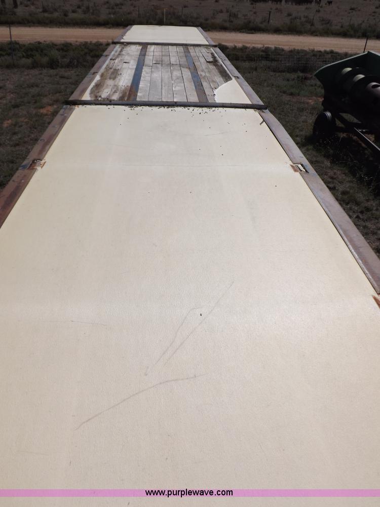 image for item H9086 2003 Transcraft TL2000F3 flatbed trailer