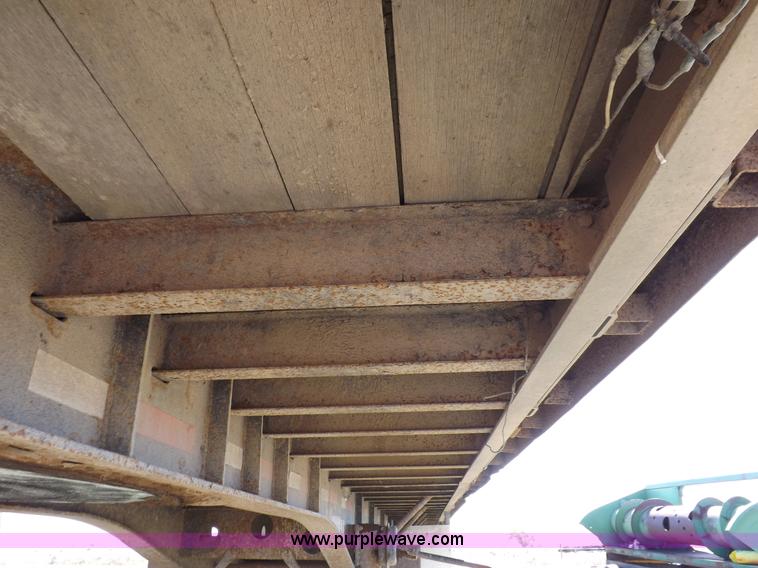 image for item H9086 2003 Transcraft TL2000F3 flatbed trailer