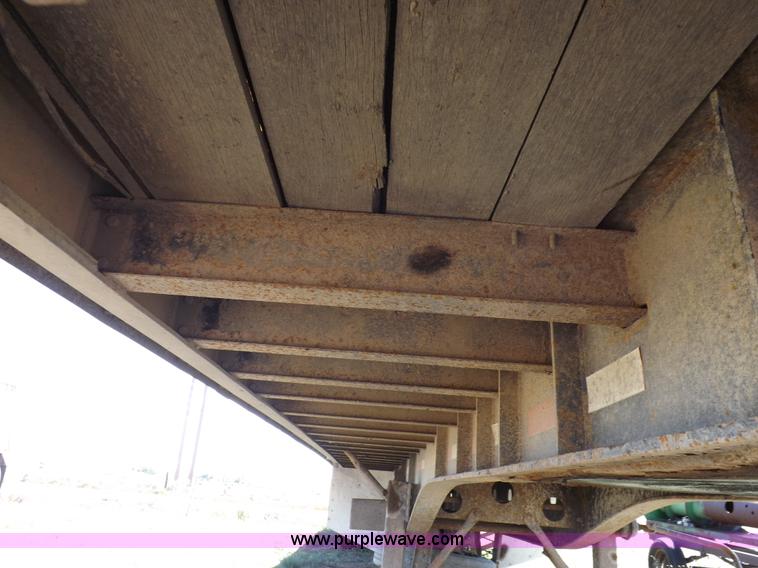 image for item H9086 2003 Transcraft TL2000F3 flatbed trailer