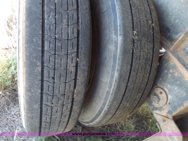 image for item H9086 2003 Transcraft TL2000F3 flatbed trailer