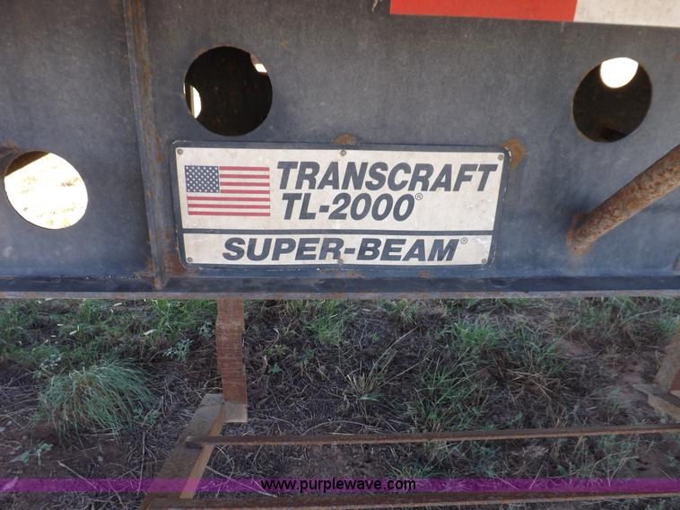 image for item H9086 2003 Transcraft TL2000F3 flatbed trailer